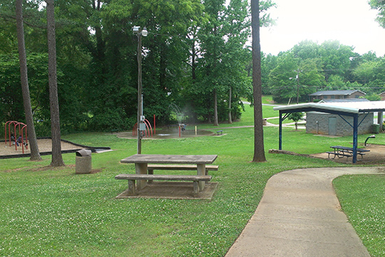 Shelter, Picnic Table, and Water Spray Park