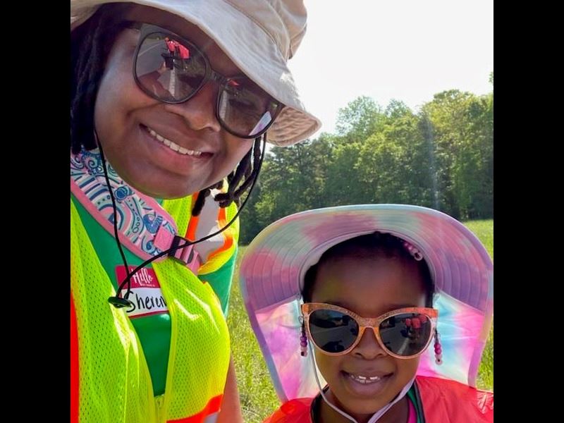 woman and child at litter sweep